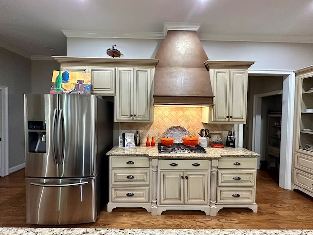 105 Lake View Dr, Hamilton, GA 31811 - kitchen featuring stainless steel appliances, cream cabinets, crown molding, decorative backsplash, and wood finished floors
