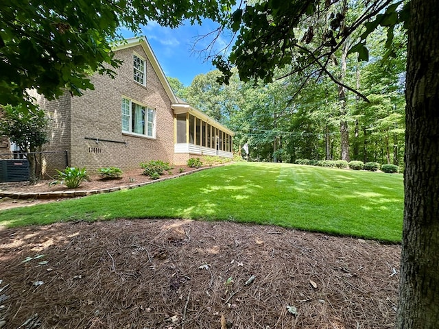 105 Lake View Dr, Hamilton, GA 31811 - view of yard with a sunroom