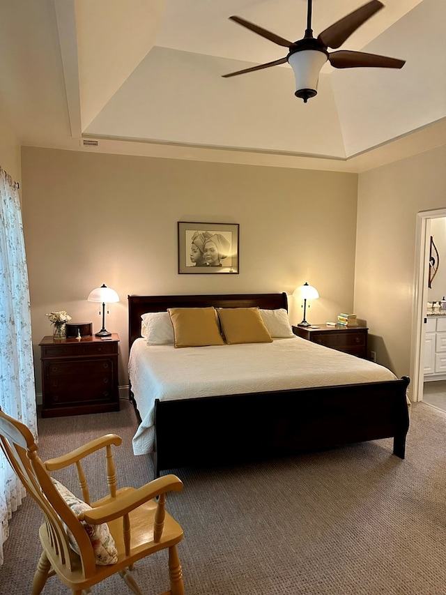 carpeted bedroom featuring ceiling fan and lofted ceiling