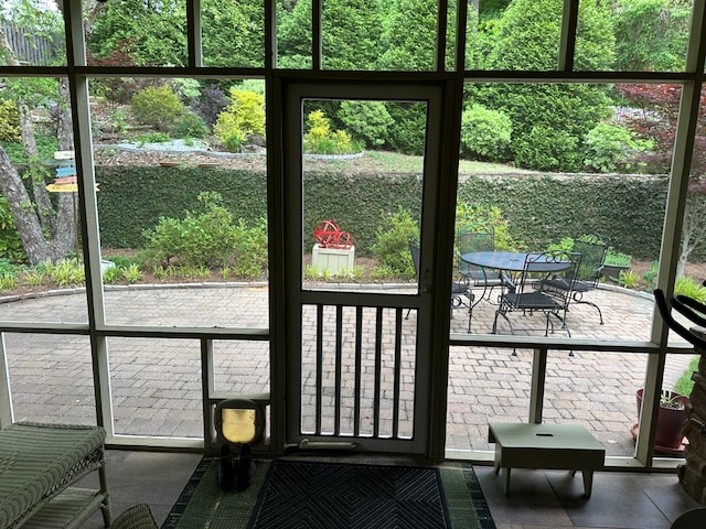 sunroom / solarium with a wealth of natural light