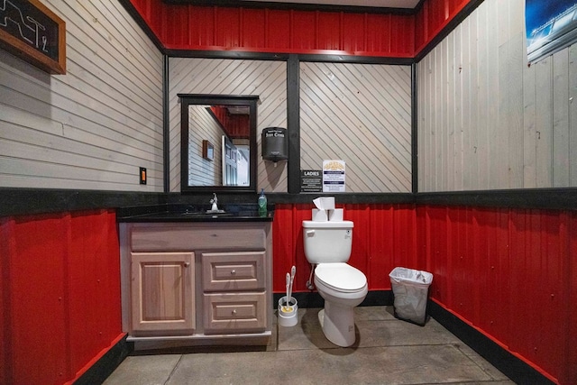 half bath with vanity and toilet