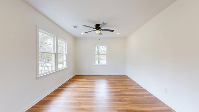 empty room with recessed lighting, visible vents, light wood-style flooring, and a ceiling fan