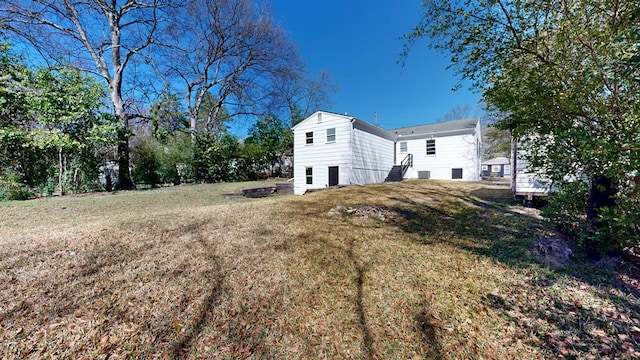 view of yard featuring entry steps