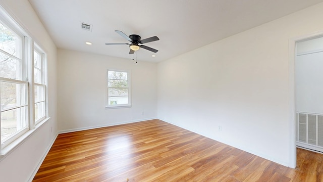 spare room with visible vents and light wood-style floors