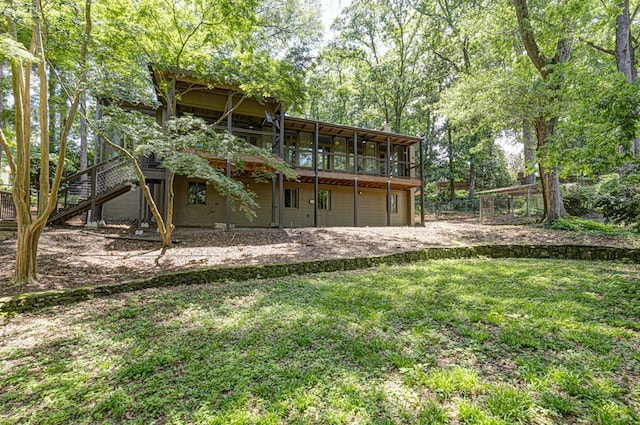 2707 Lookout Dr, Columbus, GA 31906 - back of house with stairway and a wooden deck