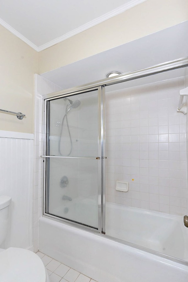 2707 Lookout Dr, Columbus, GA 31906 - full bathroom with bath / shower combo with glass door, ornamental molding, tile patterned floors, and a wainscoted wall