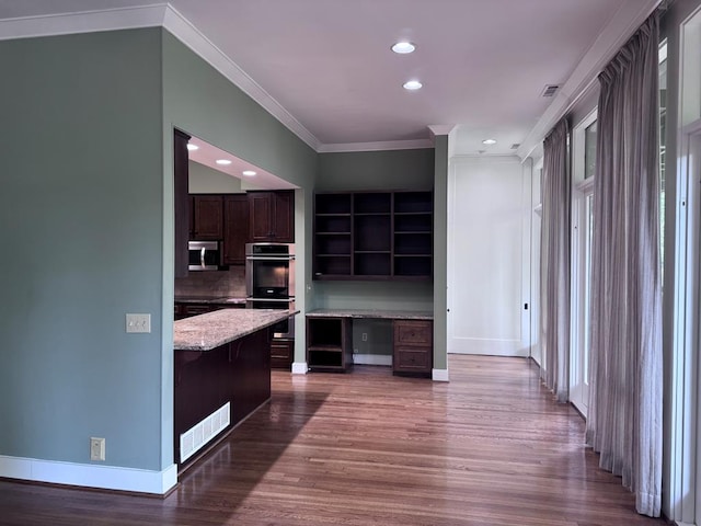 2707 Lookout Dr, Columbus, GA 31906 - kitchen featuring stainless steel appliances, open shelves, dark brown cabinets, ornamental molding, and wood finished floors