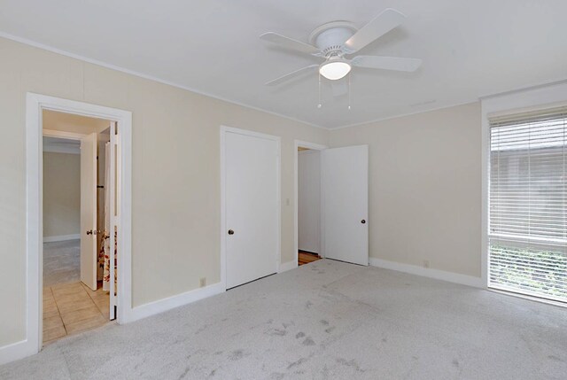 2707 Lookout Dr, Columbus, GA 31906 - unfurnished bedroom with carpet, crown molding, and a ceiling fan