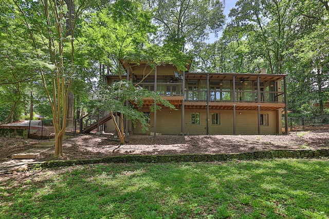 2707 Lookout Dr, Columbus, GA 31906 - rear view of house featuring a chimney, a lawn, a wooden deck, and stairway
