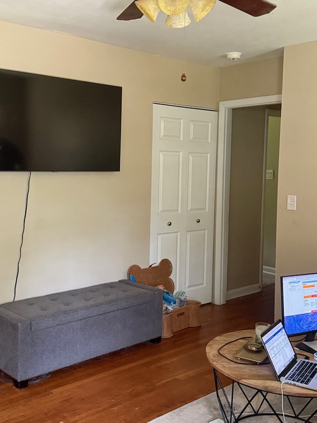 bedroom with wood finished floors and a ceiling fan