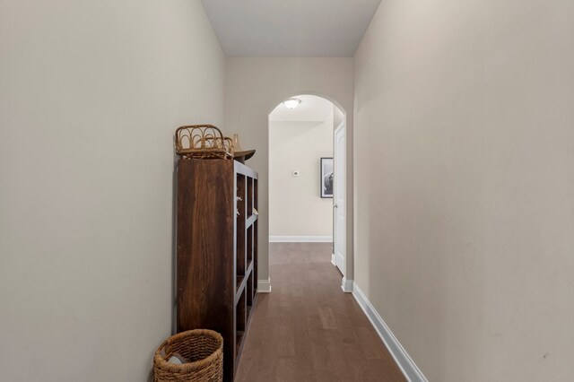 bedroom featuring a fireplace, ceiling fan, and light hardwood / wood-style flooring