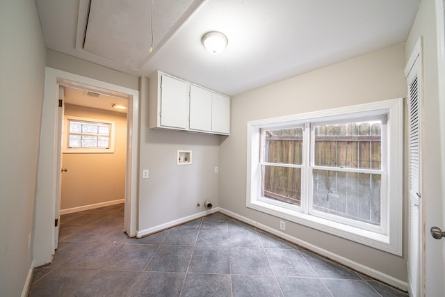 laundry area featuring cabinets, washer hookup, and hookup for a gas dryer