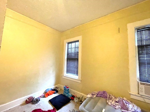 bedroom with baseboards