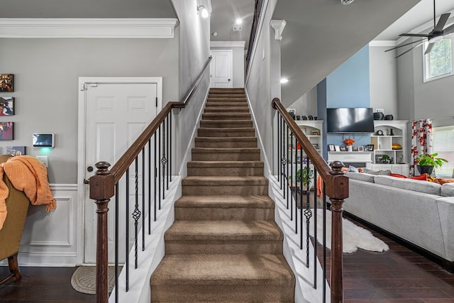 50 Riverside Lndg, Fort Mitchell, AL 36856 - stairway featuring ornamental molding, hardwood / wood-style floors, wainscoting, and a decorative wall