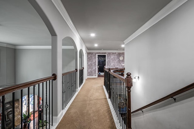 50 Riverside Lndg, Fort Mitchell, AL 36856 - hall with crown molding, recessed lighting, carpet, an upstairs landing, and brick wall