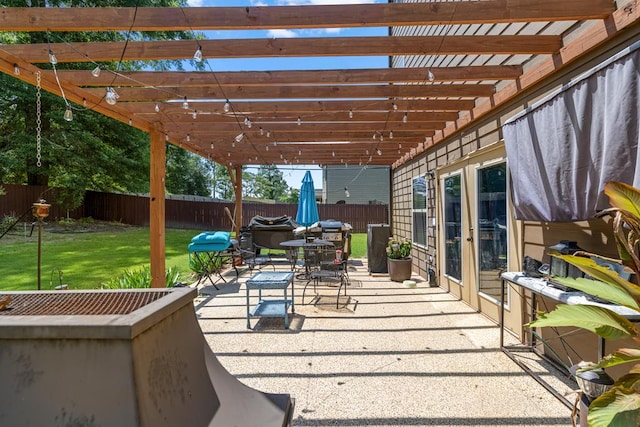 50 Riverside Lndg, Fort Mitchell, AL 36856 - fenced backyard featuring a pergola, outdoor dining area, and a patio area