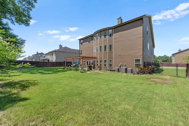 50 Riverside Lndg, Fort Mitchell, AL 36856 - back of house featuring a pergola, a fenced backyard, and a chimney