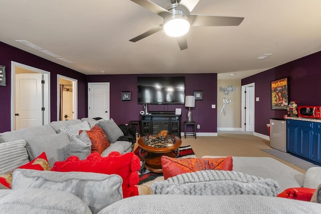 50 Riverside Lndg, Fort Mitchell, AL 36856 - living room featuring a ceiling fan, light carpet, and a fireplace