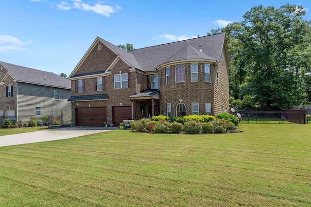 50 Riverside Lndg, Fort Mitchell, AL 36856 - view of front of home with brick siding, driveway, an attached garage, and roof with shingles