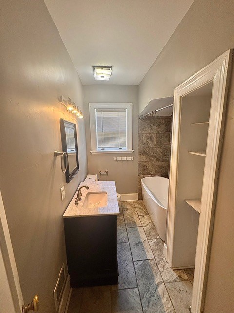 1616 Crest Dr, Columbus, GA 31906 - full bath featuring a tub to relax in, double vanity, and a shower