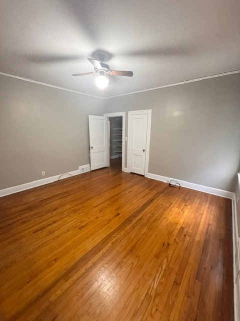 1616 Crest Dr, Columbus, GA 31906 - unfurnished bedroom featuring wood finished floors and a ceiling fan