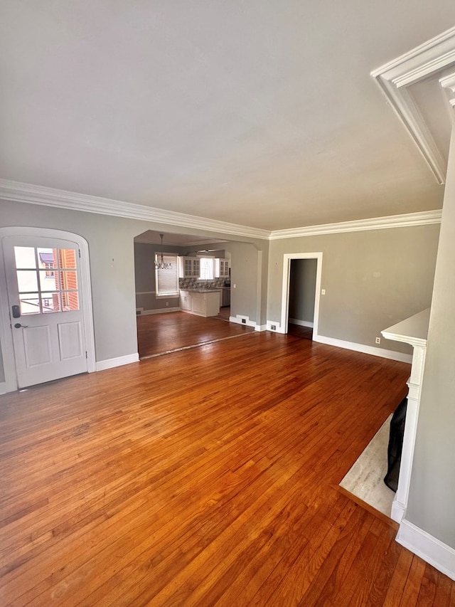 1616 Crest Dr, Columbus, GA 31906 - unfurnished living room with ornamental molding and wood finished floors