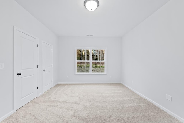 33 Oak Ridge Dr, Waverly Hall, GA 31831 - unfurnished bedroom featuring carpet floors, visible vents, and baseboards