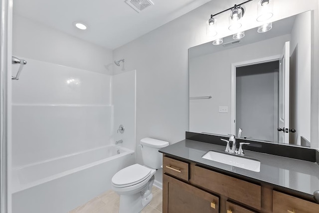 full bathroom with tile patterned floors, vanity, toilet, and shower / washtub combination