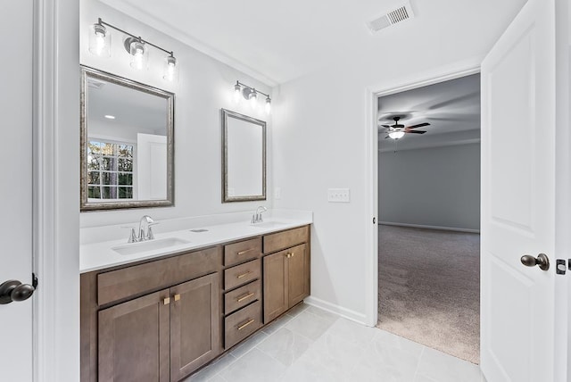 33 Oak Ridge Dr, Waverly Hall, GA 31831 - bathroom with double vanity, visible vents, ceiling fan, and a sink