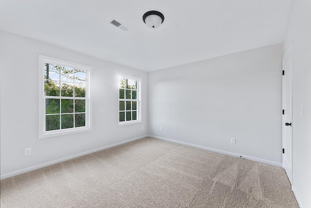 33 Oak Ridge Dr, Waverly Hall, GA 31831 - empty room with baseboards, visible vents, and carpet flooring