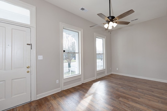 entryway featuring ceiling fan and dark hardwood / wood-style floors