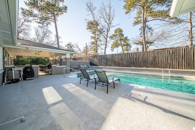 view of pool featuring a fenced in pool, a patio, and a fenced backyard