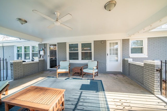 exterior space with a ceiling fan