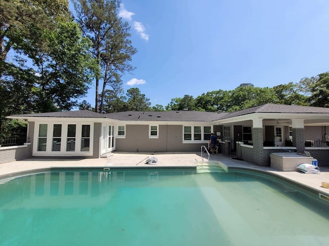 outdoor pool with a patio