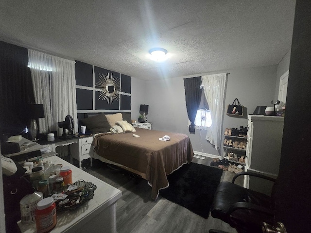 20 Patch Dr, Columbus, GA 31903 - bedroom with a textured ceiling and wood finished floors