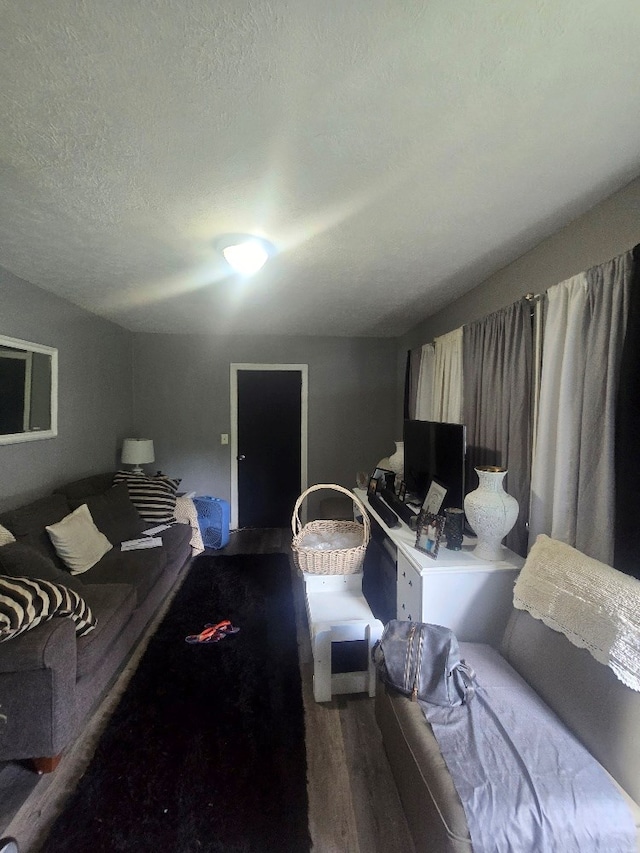 20 Patch Dr, Columbus, GA 31903 - living room with wood finished floors and a textured ceiling