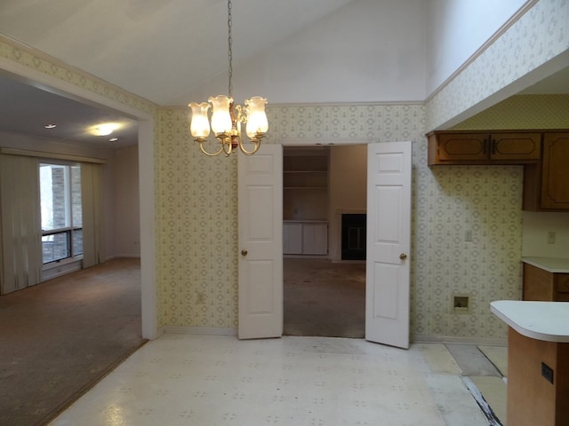 unfurnished dining area with wallpapered walls, light floors, baseboards, and a chandelier