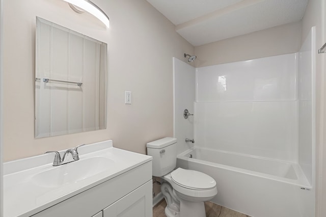 bathroom featuring vanity, toilet, and shower / bath combination
