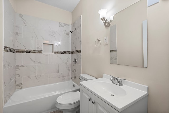 bathroom with vanity, toilet, and bathtub / shower combination