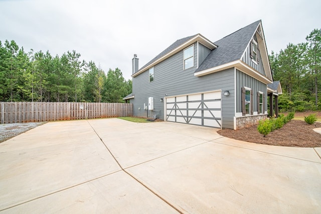 view of home's exterior with a garage