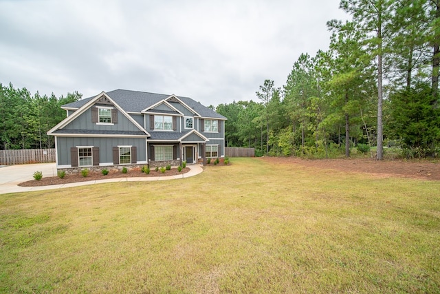 craftsman-style house featuring a front lawn