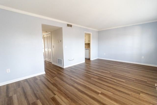 unfurnished room featuring crown molding and dark hardwood / wood-style flooring