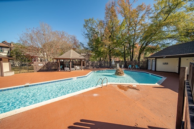 view of pool featuring a gazebo and a patio