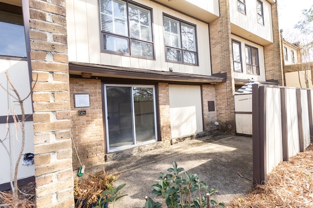 rear view of property featuring a patio area