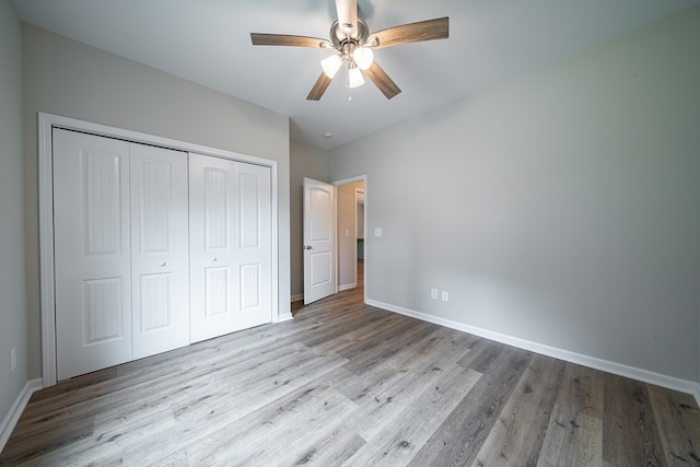 821 Lichfield Rd, Columbus, GA 31904 - unfurnished bedroom with wood finished floors, a closet, and a ceiling fan