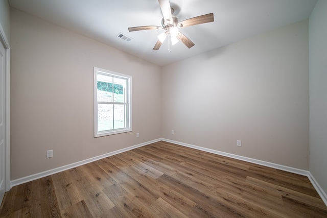 821 Lichfield Rd, Columbus, GA 31904 - empty room with wood finished floors and ceiling fan