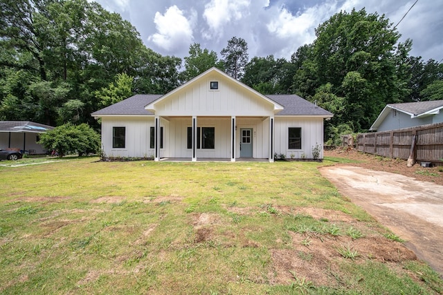 821 Lichfield Rd, Columbus, GA 31904 - modern inspired farmhouse with board and batten siding, covered porch, driveway, and roof with shingles