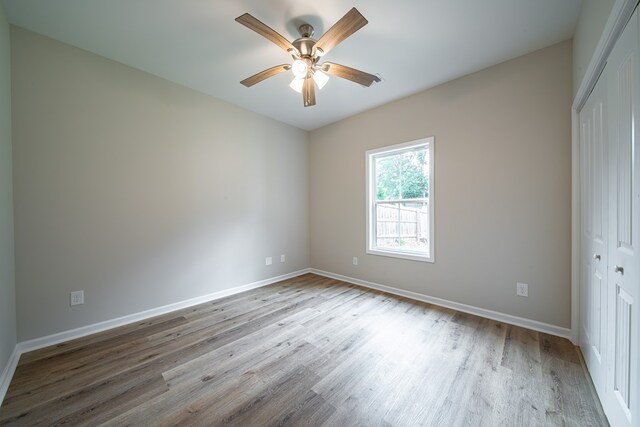 821 Lichfield Rd, Columbus, GA 31904 - unfurnished bedroom featuring a closet, wood finished floors, and a ceiling fan