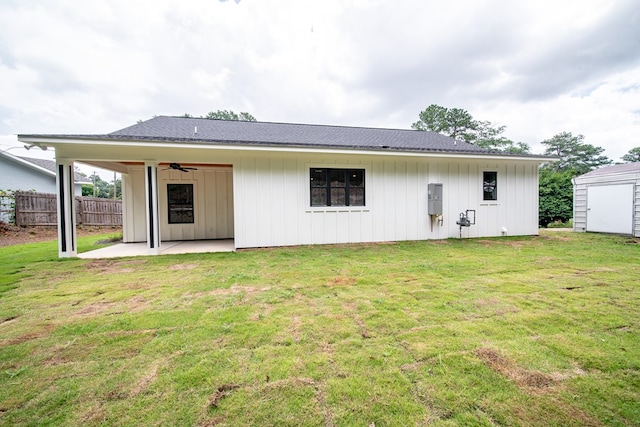 821 Lichfield Rd, Columbus, GA 31904 - rear view of house featuring a patio area, a ceiling fan, and board and batten siding