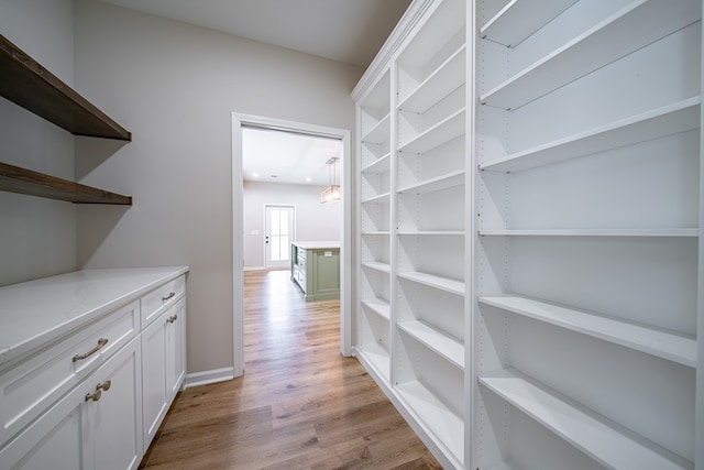 821 Lichfield Rd, Columbus, GA 31904 - corridor featuring light wood-style floors and baseboards